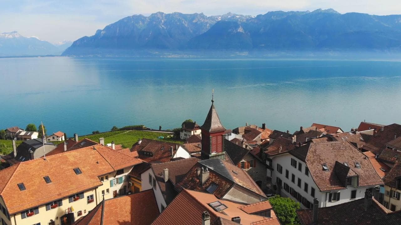 Lakeside village and Alps above Lake Léman in Vaud